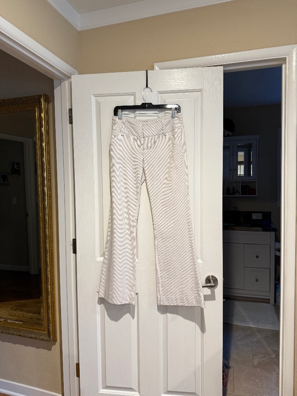 Alice and Olivia full belled mid/low rise seersucker pants in cream/tan stripe.